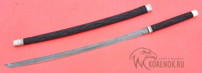 Катана (дамасская сталь, резная ручка и ножны) Длина клинка 710 мм
Общая длина в  ножнах 99 см.
Рукоять 275 мм.